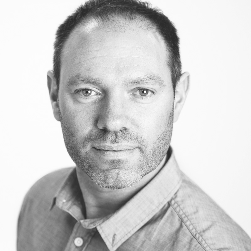 Black and white headshot of Rob Coumbe, co-founder of Hutch.