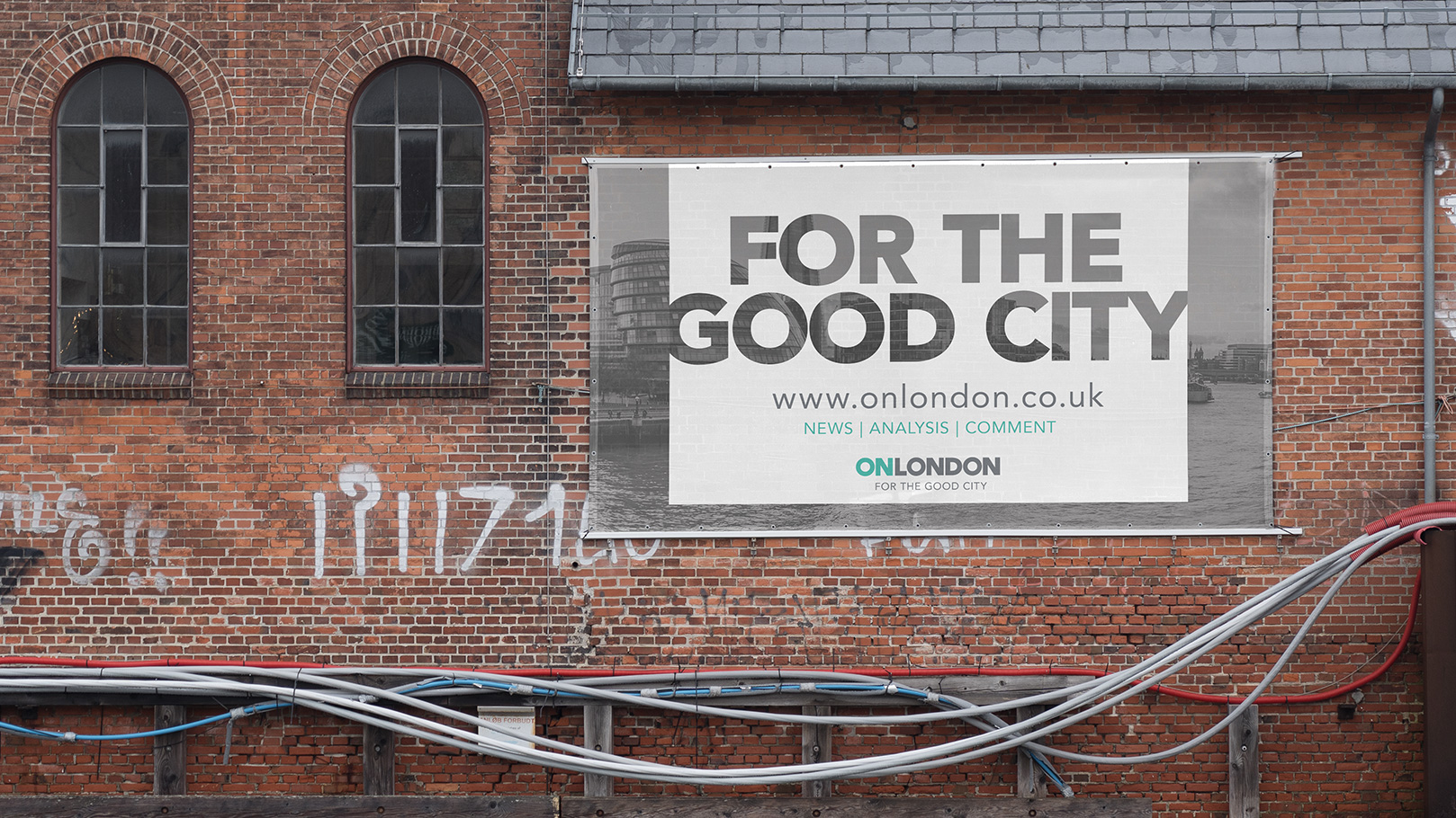 A banner on a building wall advertising OnLondon